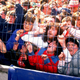 Fans are crushed into a steel barrier surrounding the pitch at Hillsborough Stadium. (Photo credit: David Cannon/Getty)